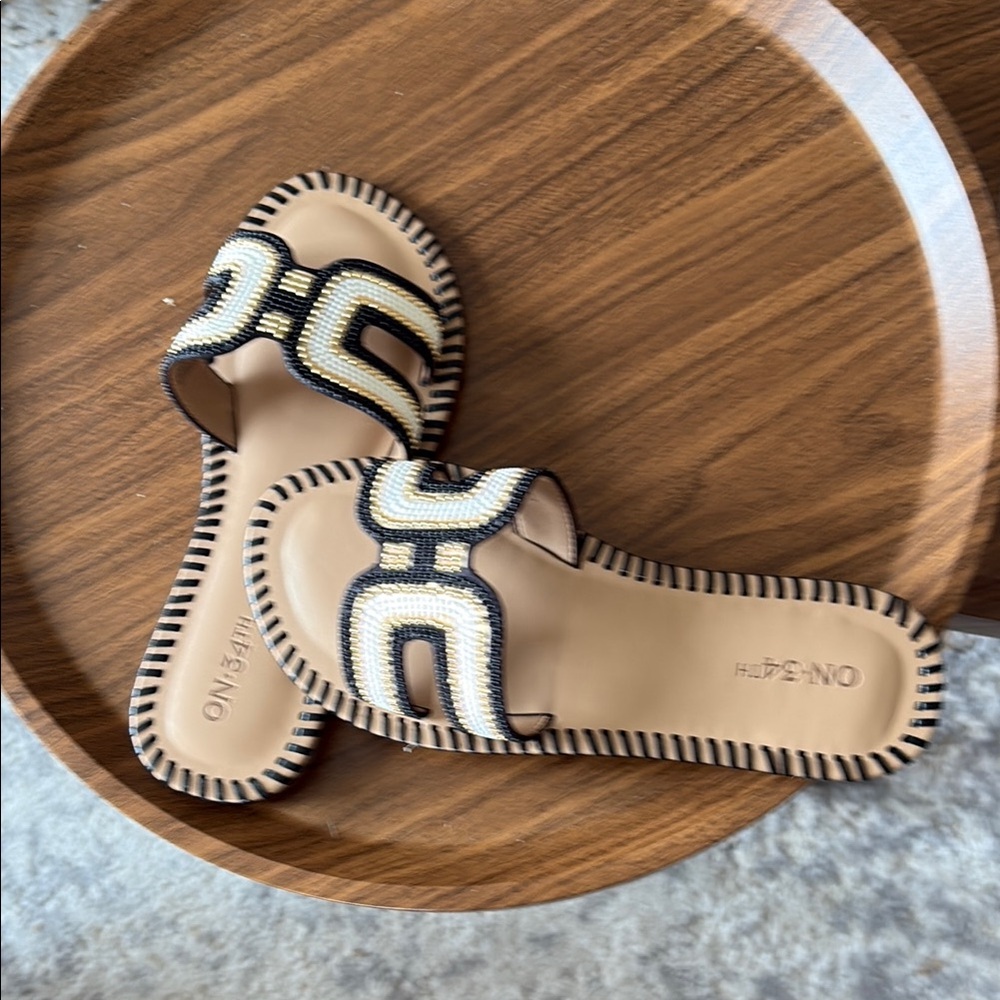 Tan and Black Slide Sandals with Artisanal Stitching